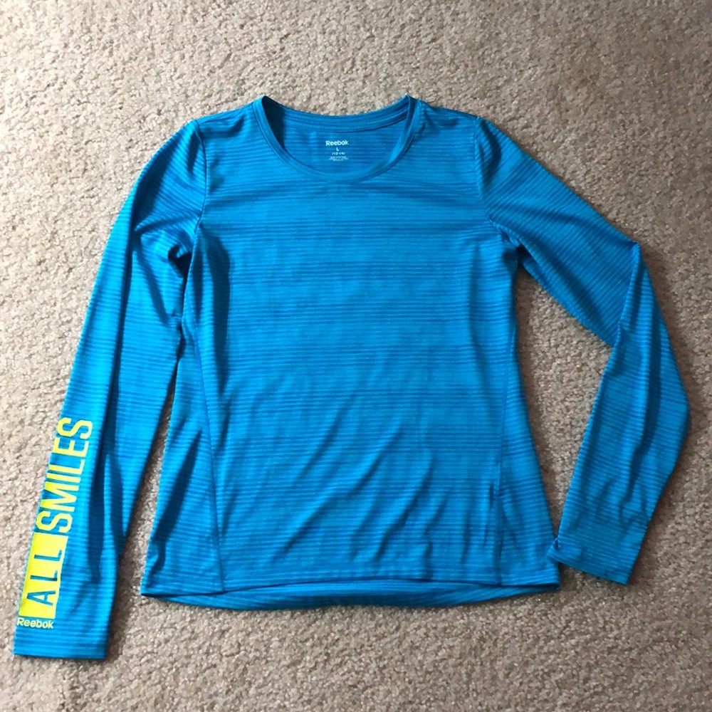 EUC Reebok speedwick active shirt with all smiles sleeve